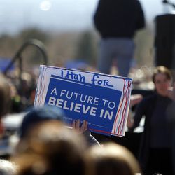 A sign supporting Democratic presidential candidate and Vermont Sen. Bernie Sanders is waved before a speech to supporters at This is the Place Heritage Park in Salt Lake City, Friday, March 18, 2016.