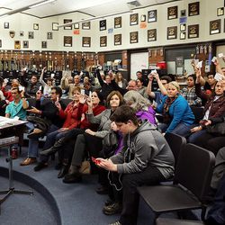 Precinct Chairman Garner Meads asks for voters to be counted during a Utah Republican caucus at Brighton High School in Salt Lake City on Tuesday, March 22, 2016.