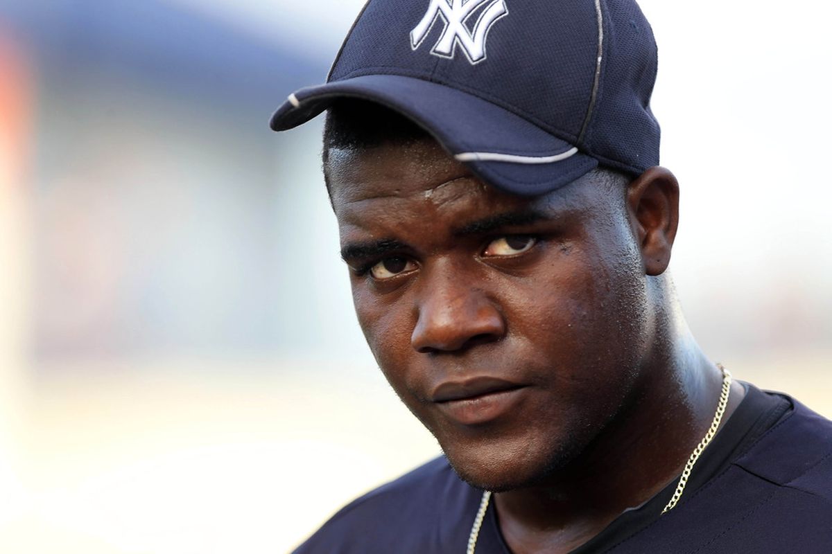 March 20, 2012; Tampa, FL, USA; New York Yankees starting pitcher Michael Pineda (35) walks to the dugout after he warmed up and gets ready to pitch against the Pittsburgh Pirates at George M. Steinbrenner Field. Kim Klement-US PRESSWIRE