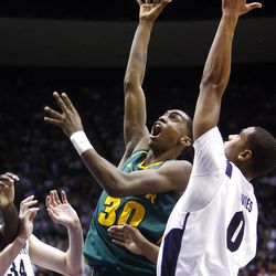 Baylor's #30 Quincy Miller shoots over the defense of BYU's #0 Brandon Davies as BYU and Baylor play Saturday, Dec. 17, 2011 in the Marriott Center in Provo. Baylor won 86-83.