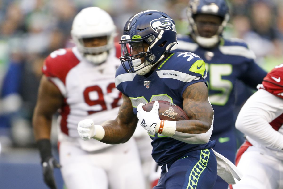 Seattle Seahawks running back Chris Carson rushes against the Arizona Cardinals during the first quarter at CenturyLink Field.