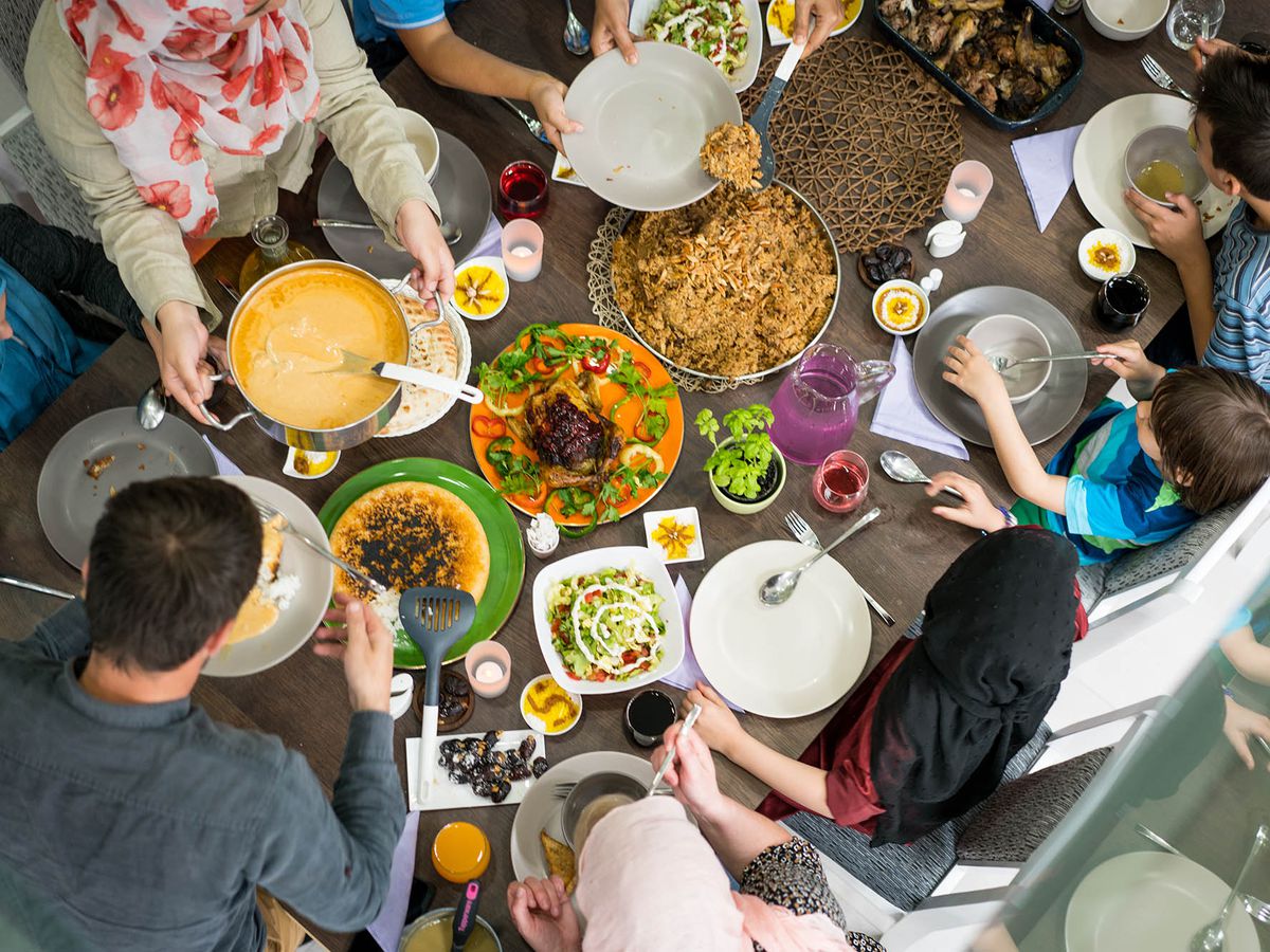 A group of people gathered around a table for a meal.
