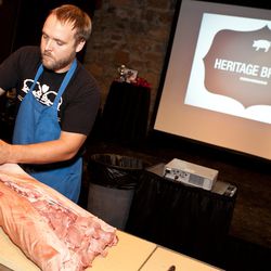 Ryan Farr has his way with a heritage pig.
