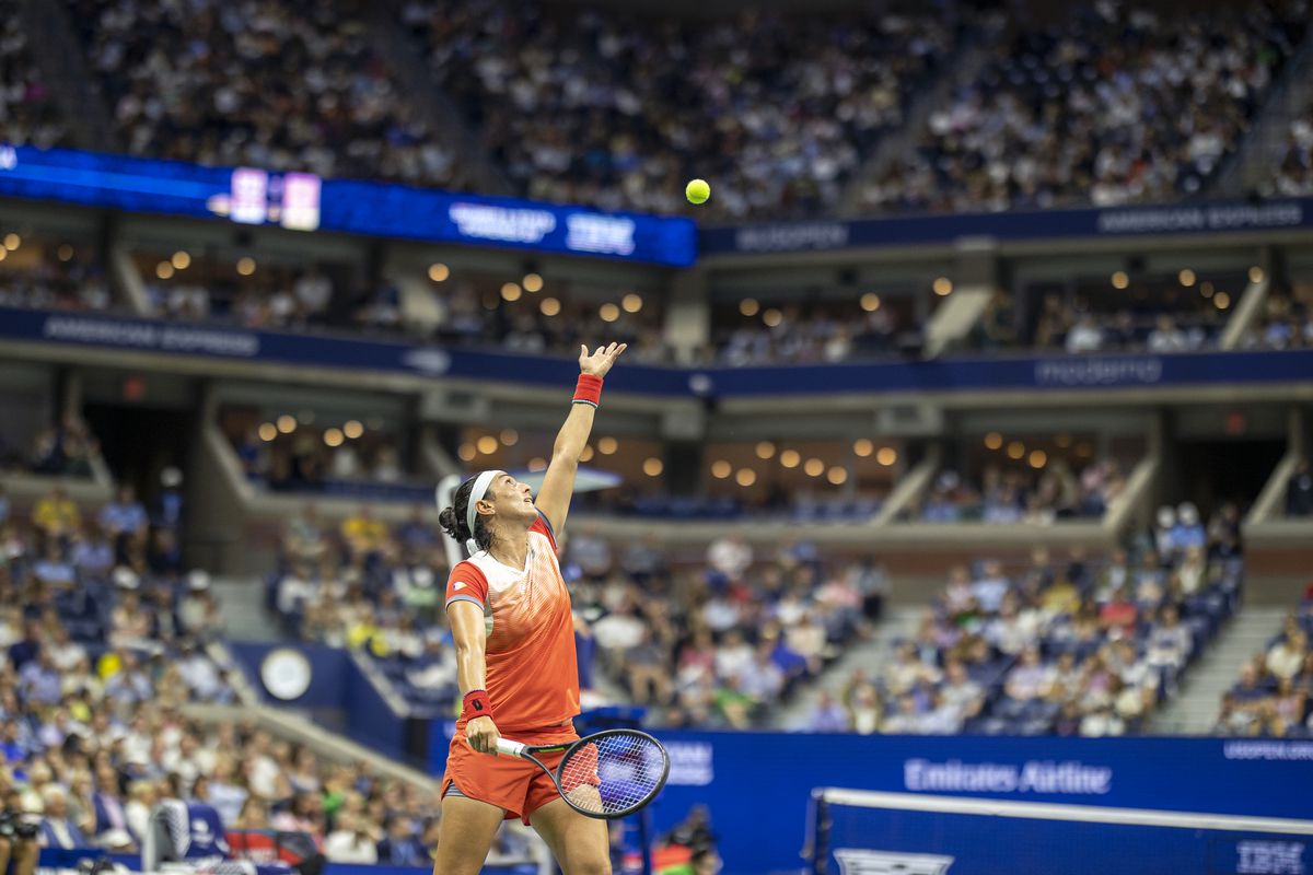 Ons Jabeur of Tunisia serving against Caroline Garcia of France in the Women’s Singles Semi-Final match on Arthur Ashe Stadium during the US Open Tennis Championship 2022 at the USTA National Tennis Centre on September 8th 2022 in Flushing, Queens, New York City.