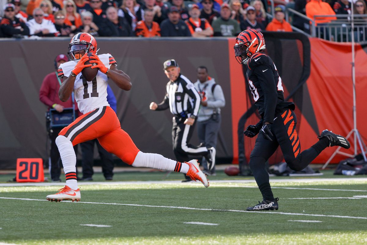 Donovan Peoples-Jones #11 of the Cleveland Browns runs with the ball while being chased by Eli Apple #20 of the Cincinnati Bengals in the second quarter at Paul Brown Stadium on November 07, 2021 in Cincinnati, Ohio.