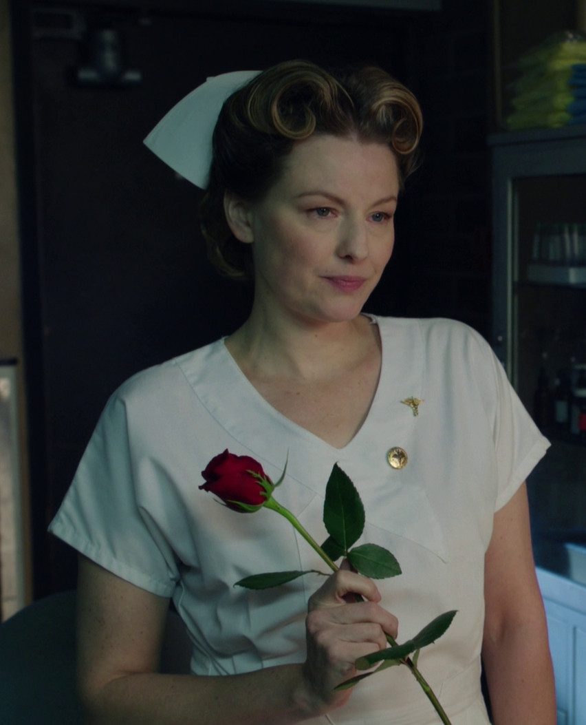 nurse ratched holding a rose