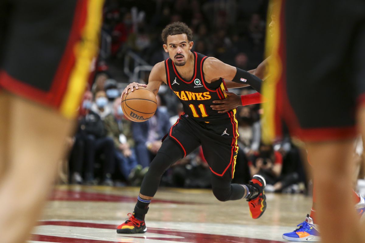 Atlanta Hawks guard Trae Young (11) dribbles against the Washington Wizards in the second half at State Farm Arena.