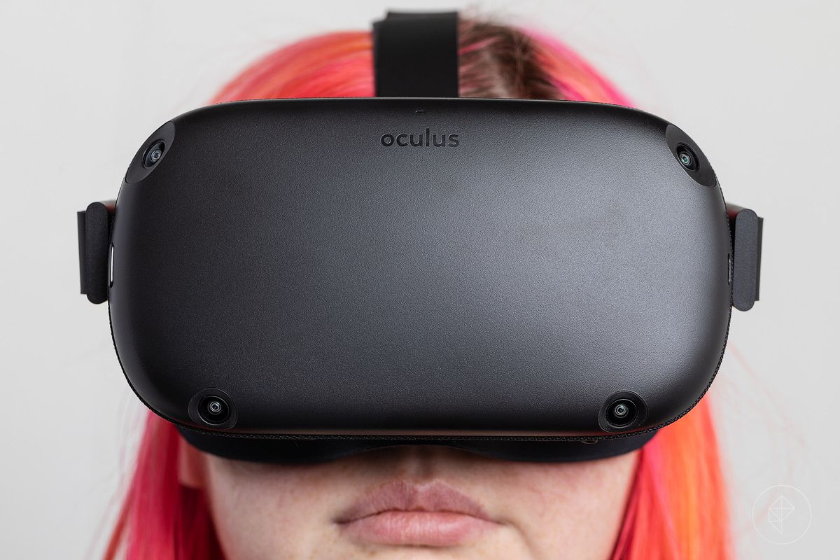 Close up of the Oculus Quest being worn by a woman with pink hair