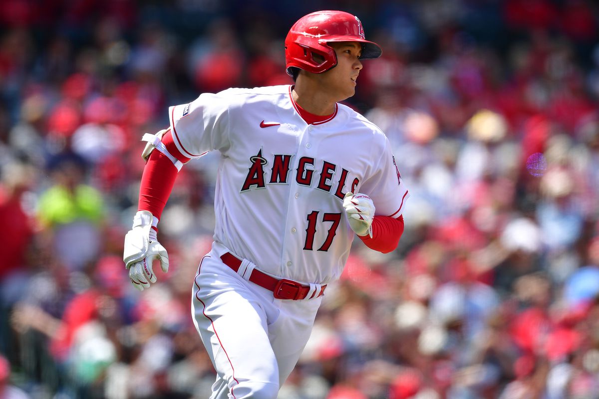 Los Angeles Angels designated hitter Shohei Ohtani runs out a fly ball against the Houston Astros during the fourth inning at Angel Stadium.