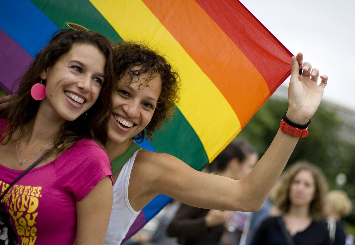 Two women at an LGBTQ pride celebration.