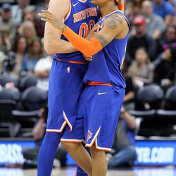 New York Knicks center Enes Kanter (00) and New York Knicks guard Trey Burke (23) play in a basketball game against their former team, the Utah Jazz, at the Vivint Smart Home Arena in Salt Lake City on Friday, Jan. 19, 2018.