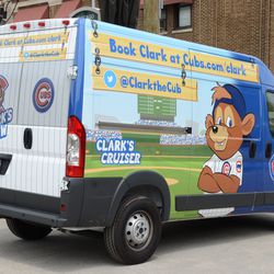 1:46 p.m. Clark's Cruiser van, parked on Waveland outside of the VIP/player's parking lot - 