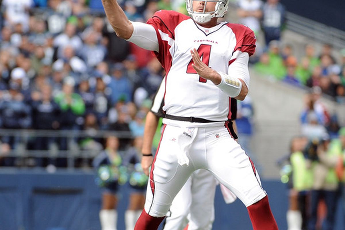 SEATTLE, WA - SEPTEMBER 25:   Kevin Kolb #4 of the Arizona Cardinals passes on a roll out against the Seattle Seahawks during the second quarter at CenturyLink Field on September 25, 2011 in Seattle, Washington.  (Photo by Harry How/Getty Images)