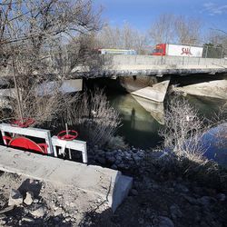 A body was discovered in the Jordan River at 3300 South in Salt Lake City, Monday, Dec. 1, 2014.