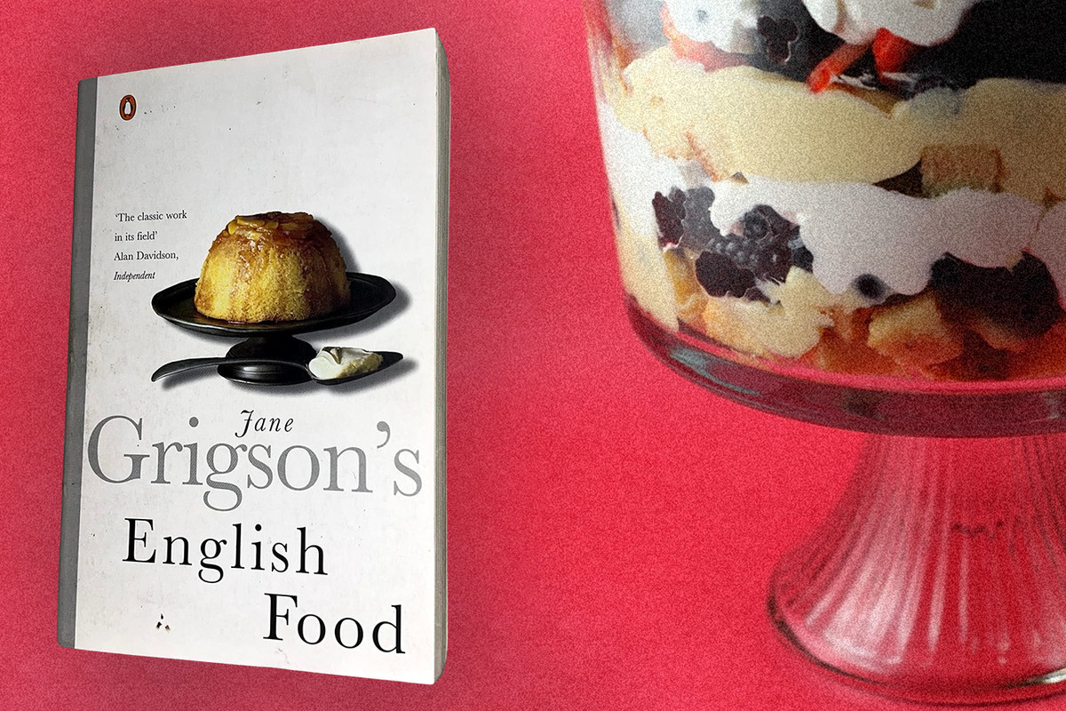 The cover of Jane Grigson’s English Food next to a layered trifle in a glass serving dish. Photo illustration.