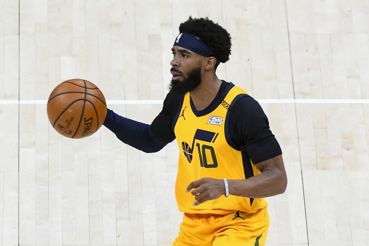 Mike Conley of the Utah Jazz in action during a game against the Charlotte Hornets at Vivint Smart Home Arena on February 22, 2021 in Salt Lake City, Utah.