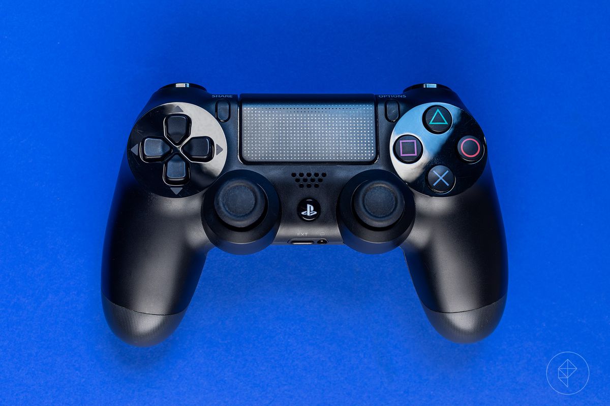 DualShock 4 controller on blue background
