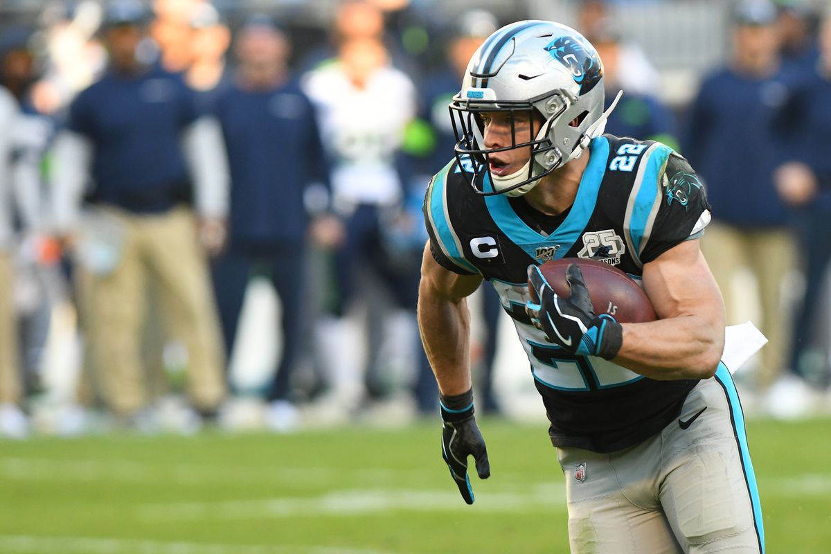 Carolina Panthers running back Christian McCaffrey runs the ball on the play in the game between the Seattle Seahawks and the Carolina Panthers on December 15, 2019 at Bank of America Stadium in Charlotte, NC.