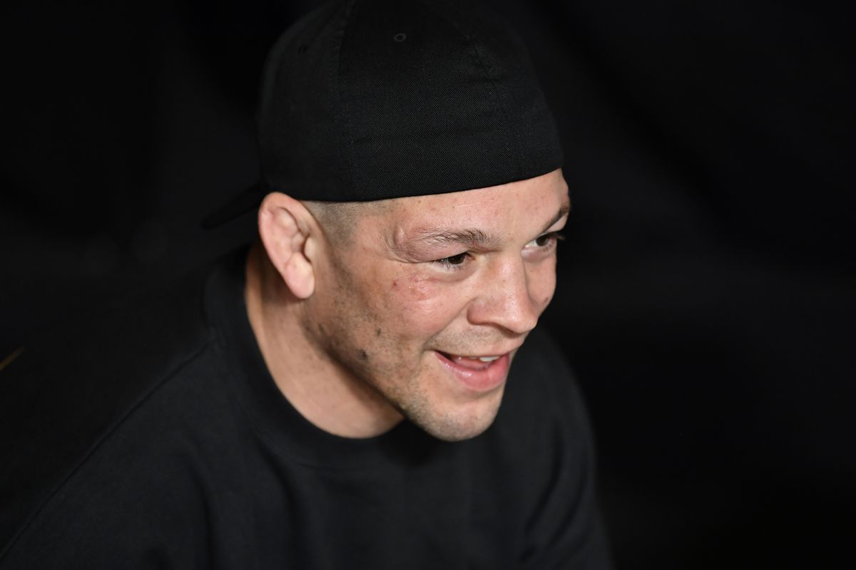 Nate Diaz watching Nick Maximov vs. Punahele Soriano at the UFC APEX.