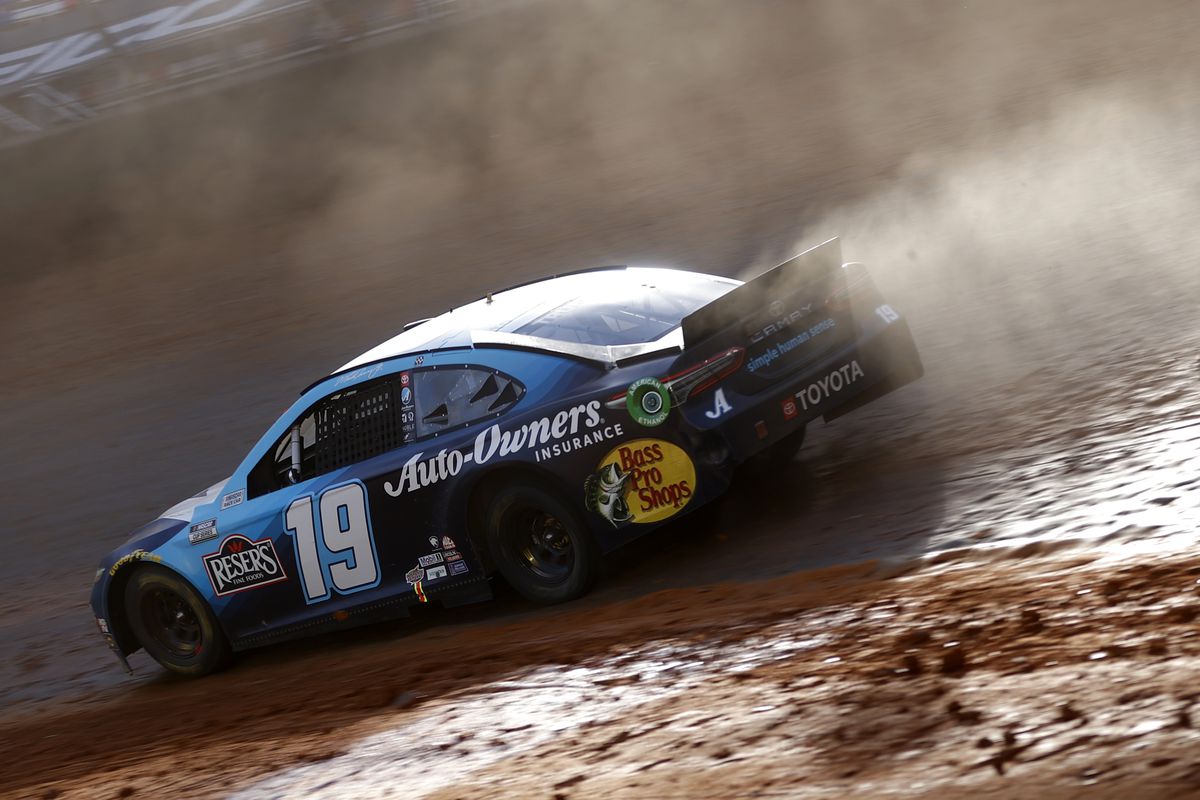 Martin Truex Jr., driver of the #19 Auto-Owners Insurance Toyota, races during the NASCAR Cup Series Food City Dirt Race at Bristol Motor Speedway on March 29, 2021 in Bristol, Tennessee.