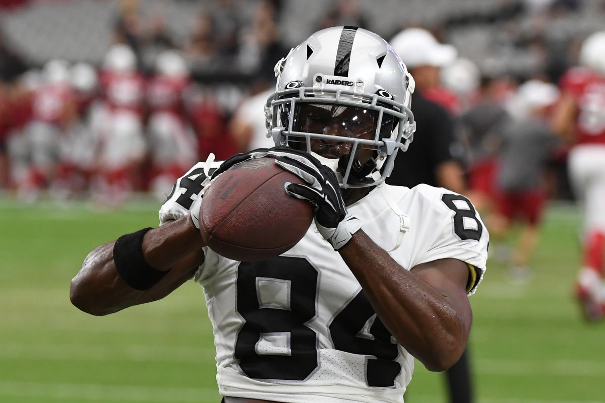 Oakland Raiders wide receiver Antonio Brown catches a pass during warmups prior to an NFL preseason game against the Arizona Cardinals at State Farm Stadium on August 15, 2019 in Glendale, Arizona.