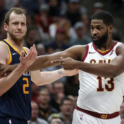 Cleveland Cavaliers center Tristan Thompson (13) motions to a referee as Utah Jazz forward Joe Ingles (2) throws up his arms at Vivint Arena in Salt Lake City on Saturday, Dec. 30, 2017.