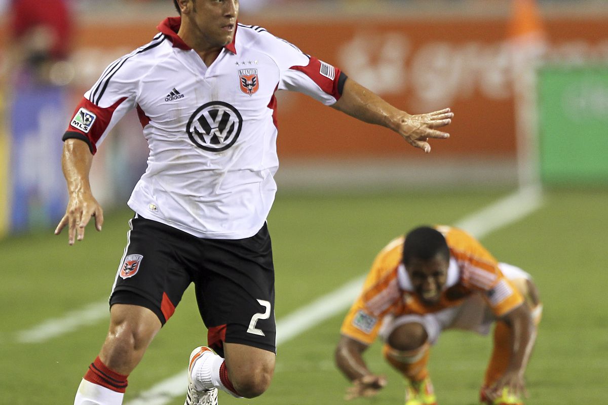 HOUSTON, TX - JULY 15:   Danny Cruz #2 of the D.C. United looks for a teammate to pass to against the Houston Dynamo at BBVA Compass Stadium on July 15, 2012 in Houston, Texas. (Photo by Bob Levey/Getty Images)