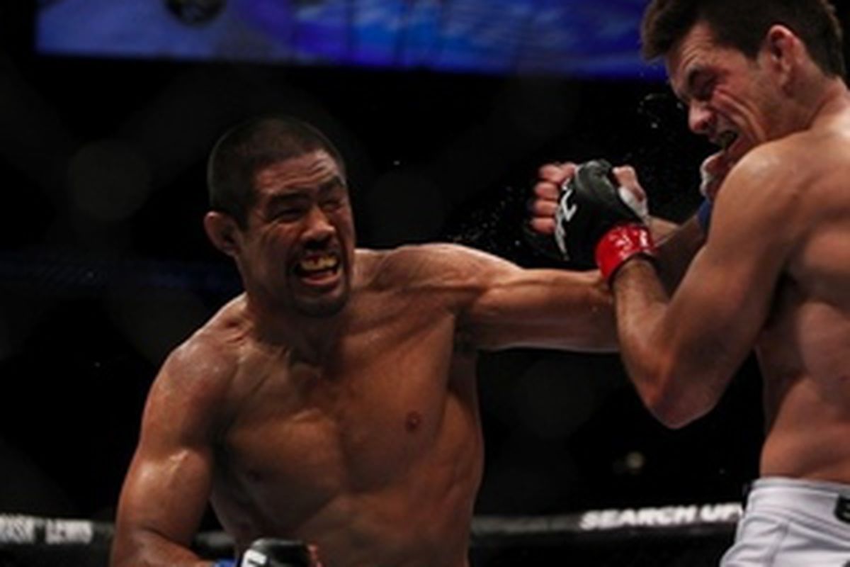 Mark Munoz (L) pictured taking on Demian Maia (R) at UFC 131 in Vancouver, British Columbia, on June 11, 2011. Photo by Esther Lin via MMAfighting.com.