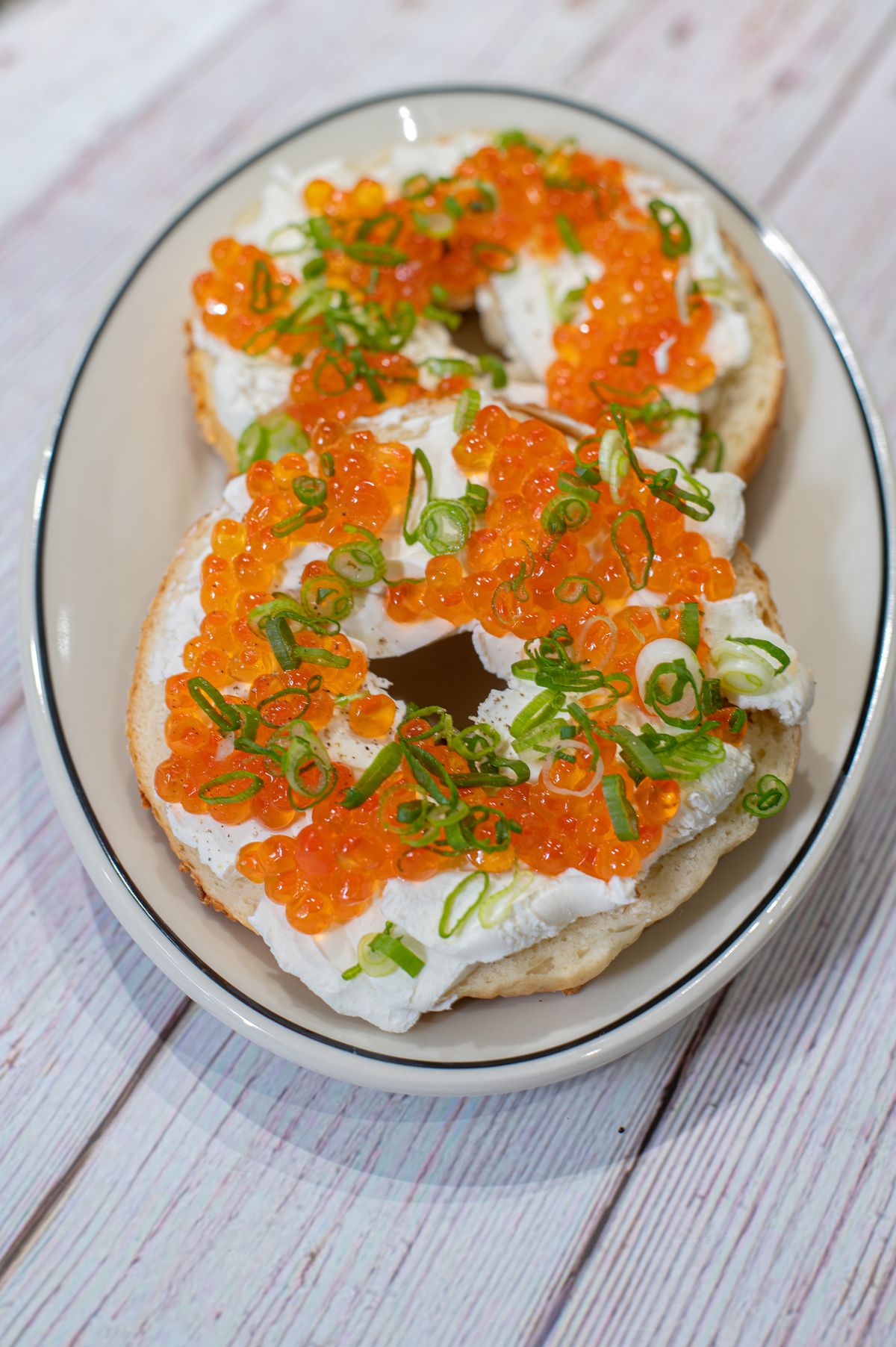 Bagel with cream cheese and roe