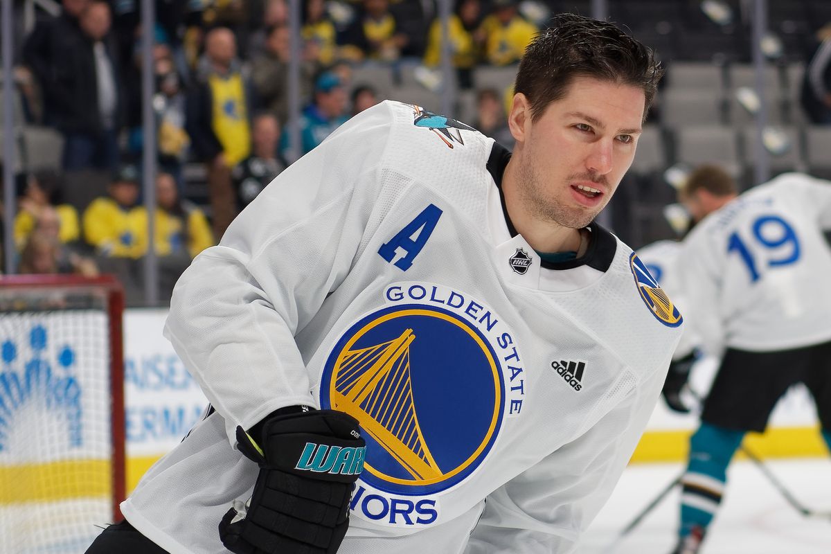 Feb 16, 2019; San Jose, CA, USA; San Jose Sharks center Logan Couture (39) skates in a Golden State Warriors jersey prior to a game against the Vancouver Canucks at SAP Center at San Jose.