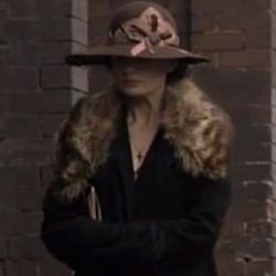 The oldest of the three main female characters and the only one not involved in the sex trade, Kate sports larger-brimmed hats and clothes in heavier fabrics like wool and brocade. She also keeps her hair long and wears it pinned up or knotted.