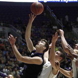 Pleasant Grove's Benji Judd (4) goes up for a shot as Davis plays Pleasant Grove in the 5A boys basketball quarterfinals at the Dee Events Center in Ogden Wednesday, Feb. 25, 2015.