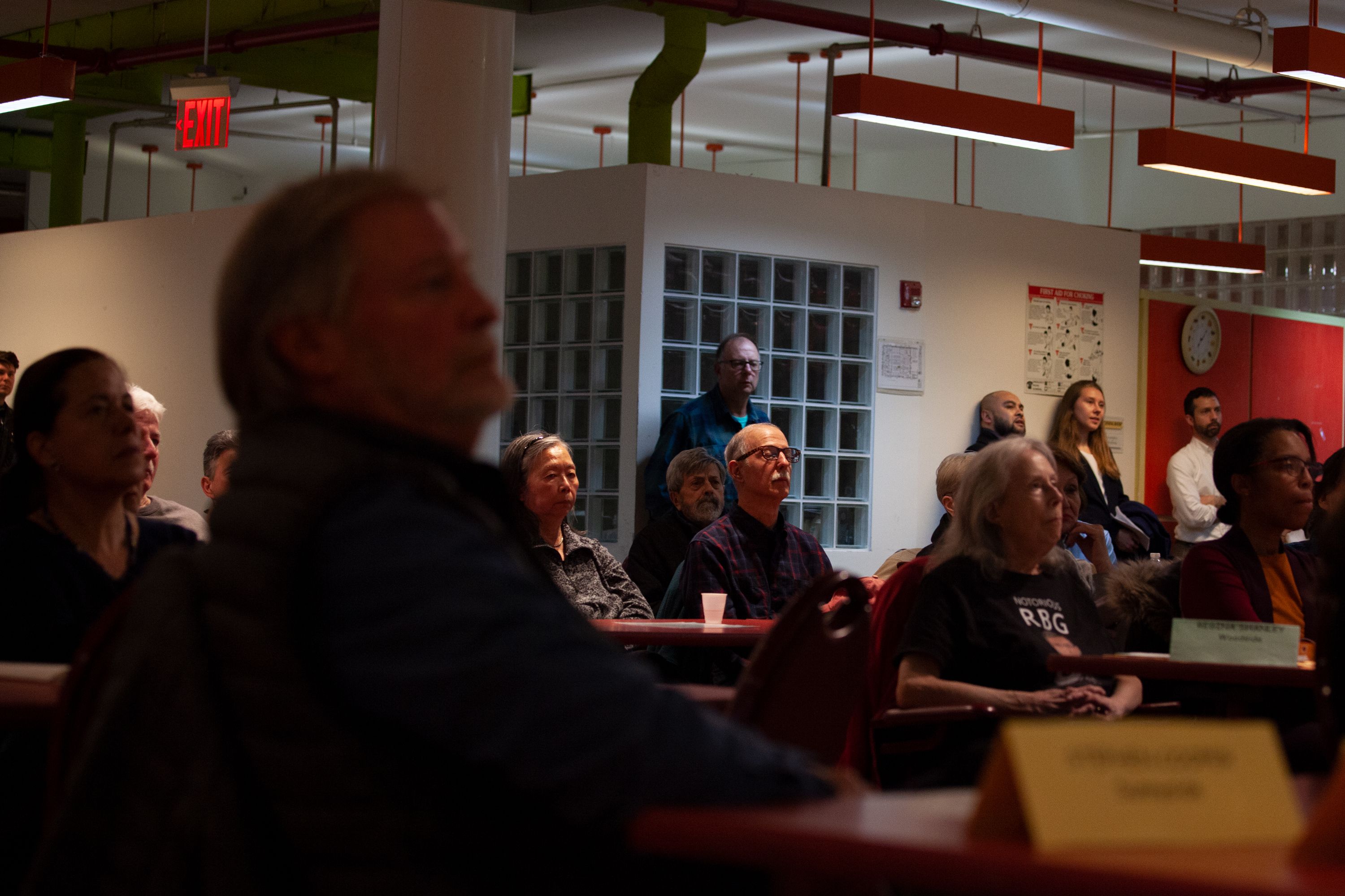 People attend a Queens Community Board 2 meeting in Sunnyside, March 5, 2020.