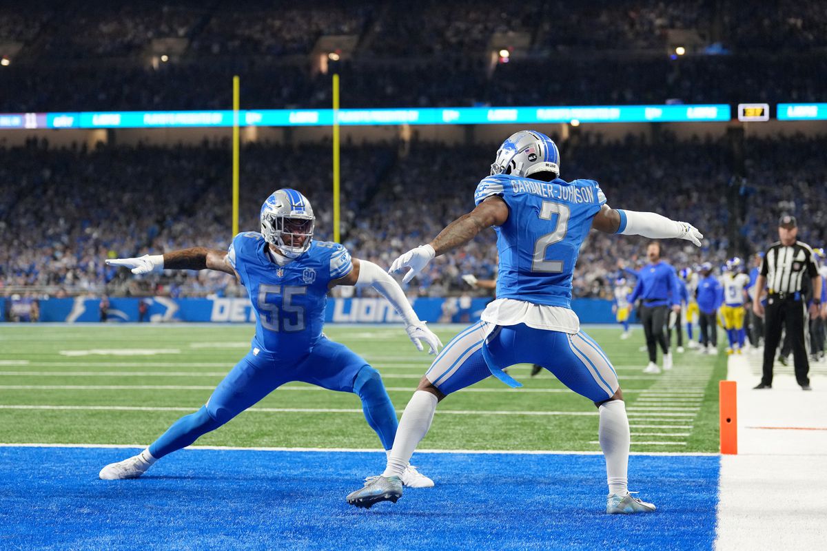 C.J. Gardner-Johnson #2 of the Detroit Lions celebrates with Derrick Barnes #55 after breaking up a pass in the end zone during the fourth quarter against the Los Angeles Rams in the NFC Wild Card Playoffs at Ford Field on January 14, 2024 in Detroit, Michigan.