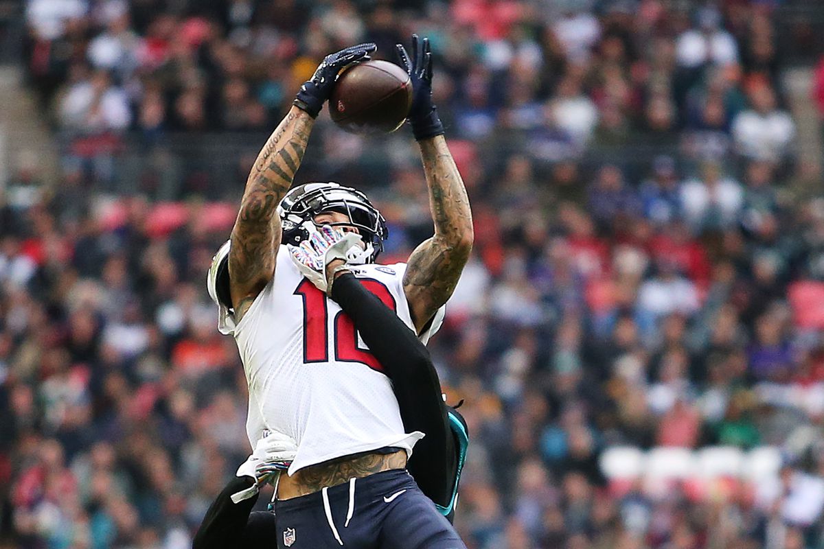 Kenny Stills of the Houston Texans makes a catch over Tre Herndon of the Jacksonville Jaguarsduring the NFL match between the Houston Texans and&nbsp;Jacksonville Jaguars at Wembley Stadium on November 03, 2019 in London, England.
