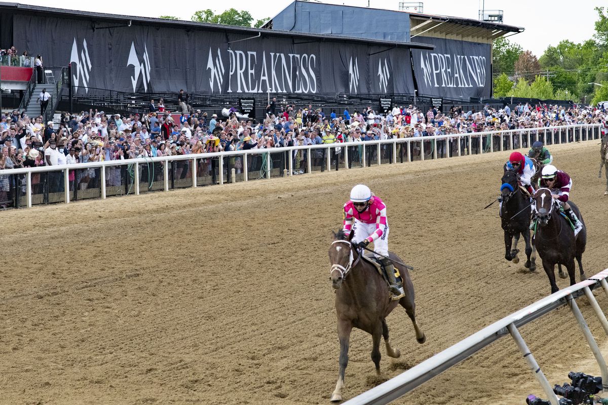 Flavien Prat aboard Rombauer wins the 146th running of the Preakness Stakes at Pimlico Race Course.