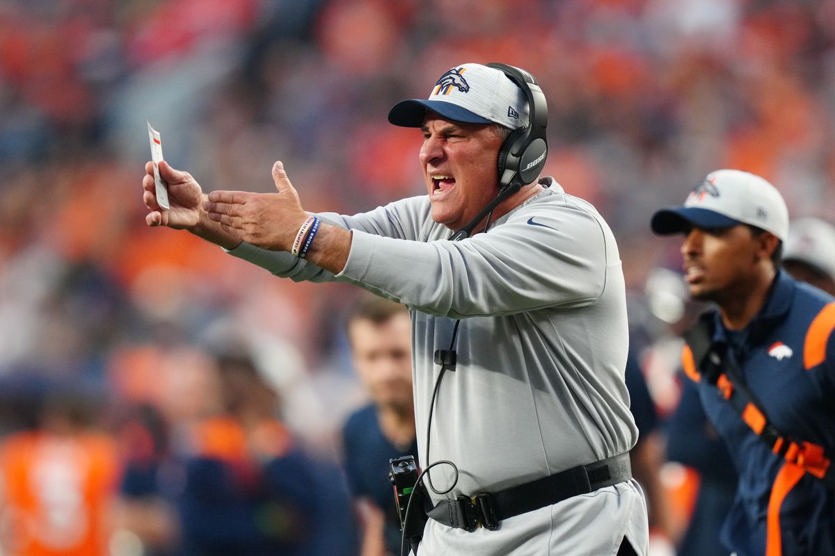 Denver Broncos head coach Vic Fangio calls out in the first quarter during a preseason game against the Los Angeles Rams at Empower Field at Mile High