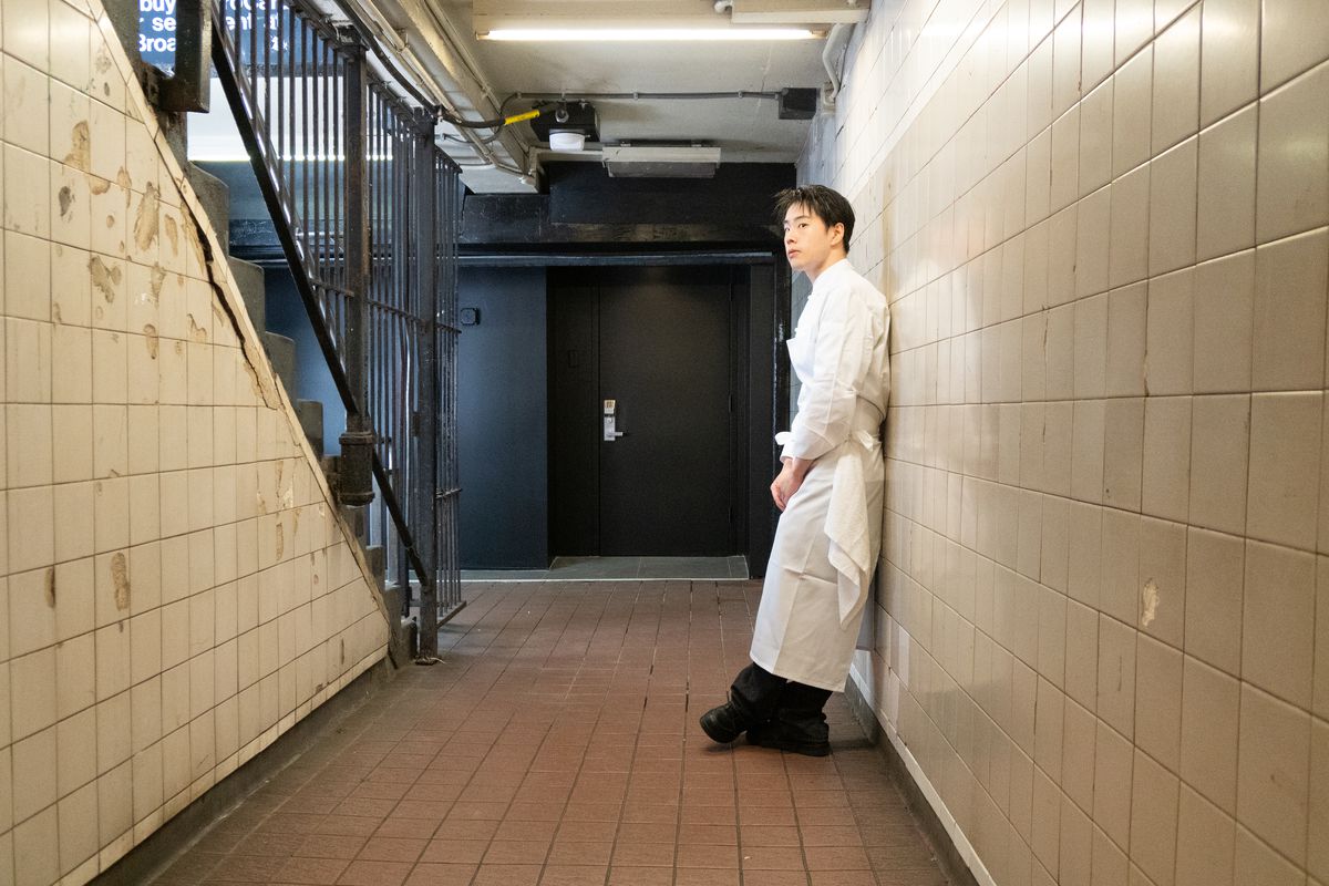 Chef Dae Kim leans up against the subway station walls by the Nōksu entrance.