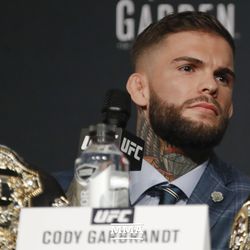 Cody Garbrandt listens to a question at UFC 217 press conference.