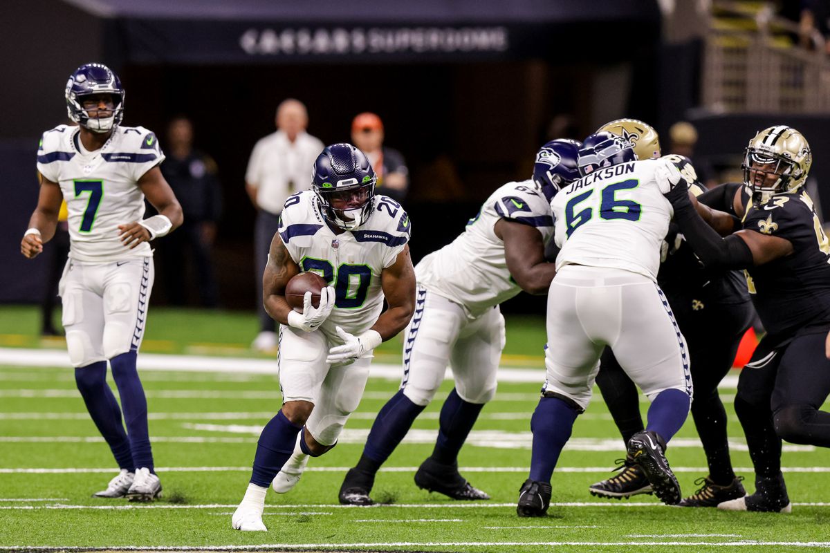Seattle Seahawks running back Rashaad Penny (20) rushes against the New Orleans Saints during the first half at Caesars Superdome.