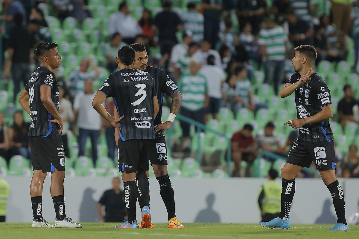 Players of Queretaro leave the field after the first half during the 1st round match between Santos Laguna and Queretaro as part of the Torneo Apertura 2023 Liga MX at Corona Stadium on July 2, 2023 in Torreon, Mexico.