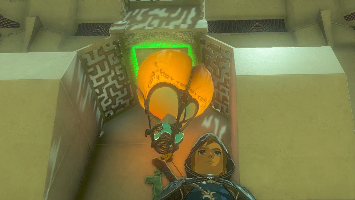 Link standing beside a hot air balloon activating a switch in the Sinakawak Shrine in the Legend of Zelda Tears of the Kingdom