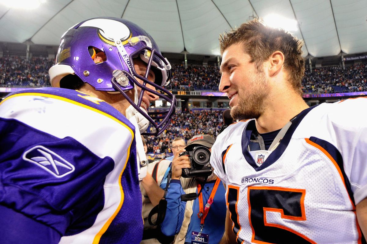 Tebow: "Think there's any chance that I end up in Minnesota competing with you for a starting job?" Ponder: "AHAHAHAHAHAHAHAHAHA!!" Tebow: "But I heard. . ." Ponder: "HAHAHAHAHAHAHA no." (Photo by Hannah Foslien/Getty Images)
