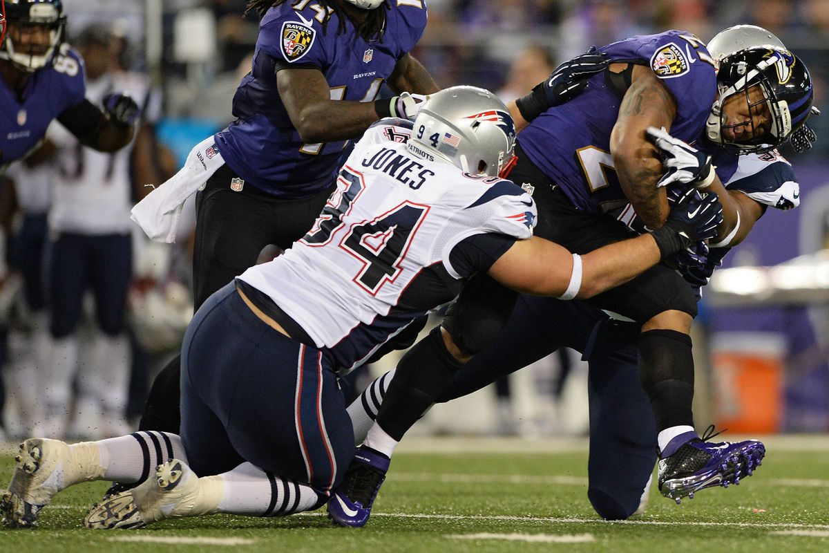 Rookie DT Chris Jones brings down Ray Rice in the Patriots' win over the Ravens last December.
