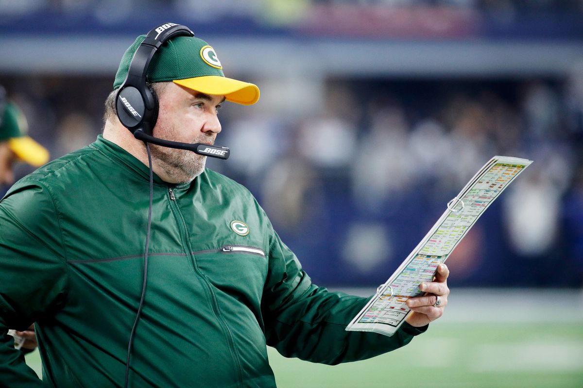 Head coach Mike McCarthy of the Green Bay Packers calls a play in the first half during the NFC Divisional Playoff Game against the Dallas Cowboys at AT&amp;T Stadium on January 15, 2017 in Arlington, Texas.