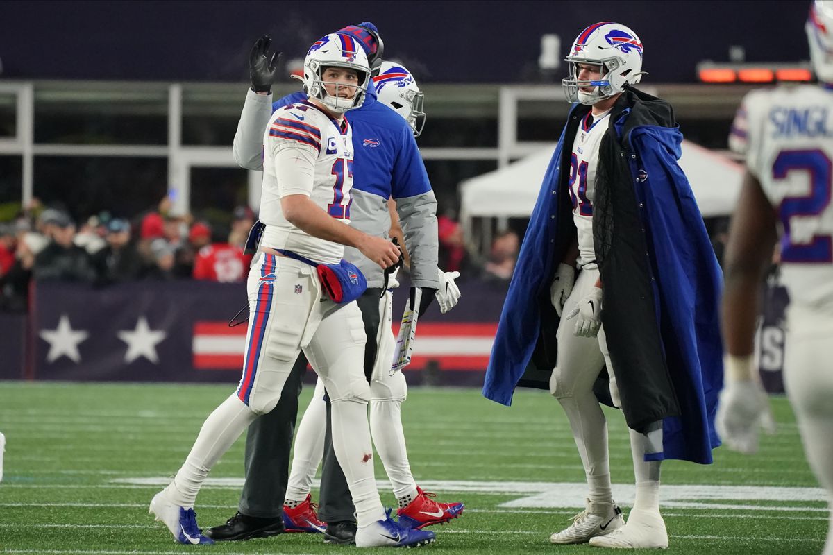 Buffalo Bills quarterback Josh Allen heads to the sideline after fourth down in the last seconds of play against the New England Patriots in the fourth quarter at Gillette Stadium.