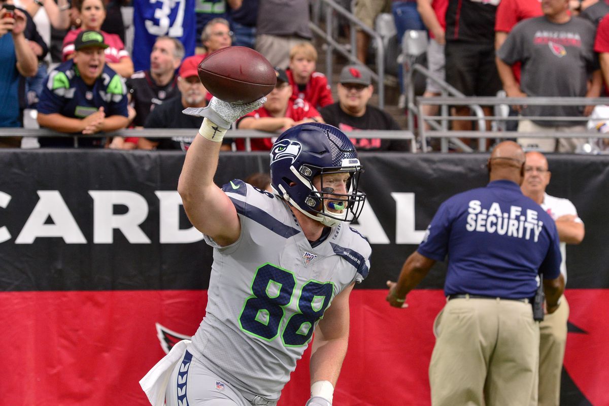 Seattle Seahawks tight end Will Dissly celebrates after catching a touchdown in the first half against the Arizona Cardinals at State Farm Stadium.&nbsp;