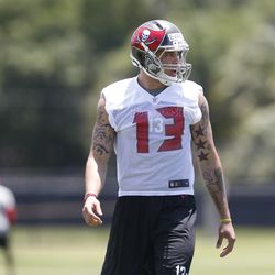 Helmets were allowed at rookie mini-camp, but the Buccaneers were not allowed to wear pads and most contact was prohibited.