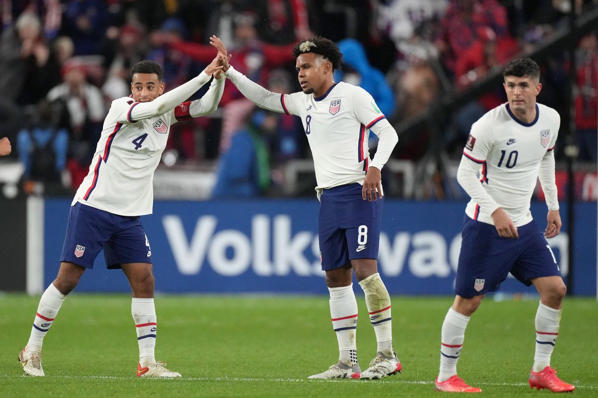 United States midfielder Weston McKennie (8) celebrates with midfielder Tyler Adams (4) and teammates after scoring a goal during a CONCACAF World Cup Qualifying game between the United States and Mexico on November 12, 2021 at TQL Stadium in Cincinnati, OH.