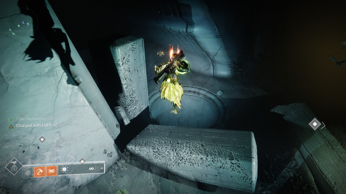 A Titan carries a relic into a small pit in Destiny 2’s version of King’s Fall